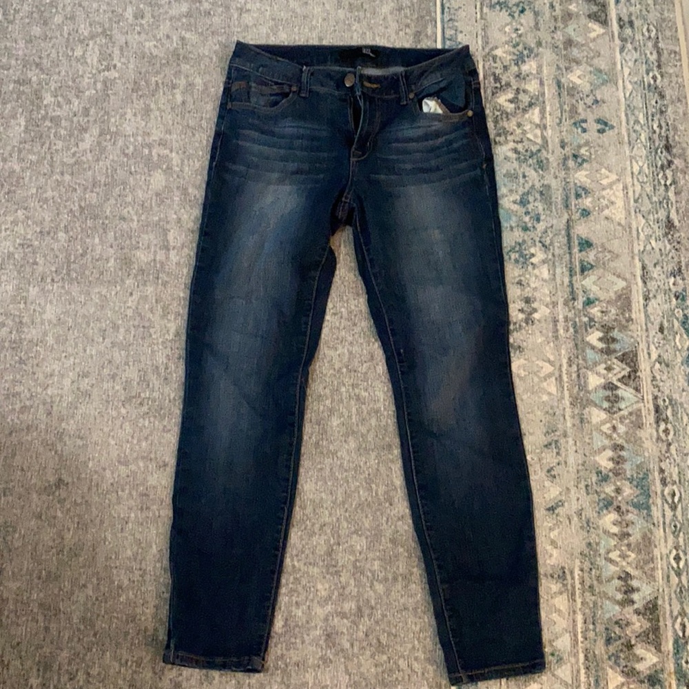 Dark wash denim jeans.